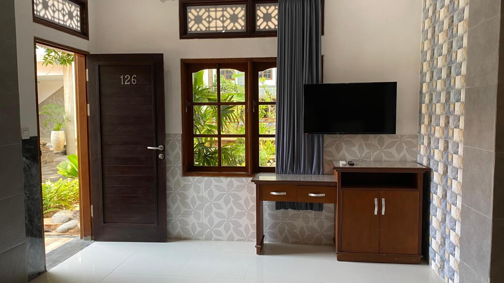 Sandat Hotel Legian Экстерьер фото